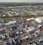 Bird's eye view of Bauma with numerous stands and construction machinery.