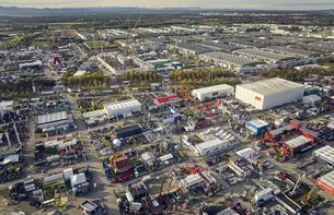 Bird's eye view of Bauma with numerous stands and construction machinery.