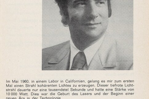 Black and white photo of a man in a suit with German text describing the invention of the laser in 1960.