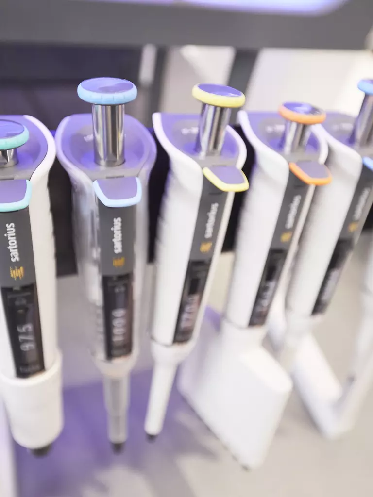 Six mechanical pipettes in a row