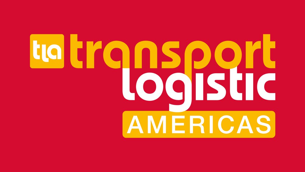 The transport logistic AMERICAS logo in yellow and white lettering on a red background with the initials “tla” in a yellow square in front of it.