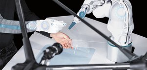 In a futuristic environment, a robotic arm interacts precisely with a person's gloved hand.