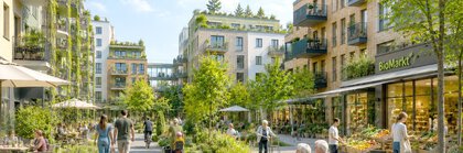 A green urban neighborhood with a sandbox, shops, and a sidewalk where people of all ages stroll between the residential buildings.
