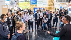 Visitors on the DWA's “Digitalization in the German water industry” solution tour listen to an exhibitor