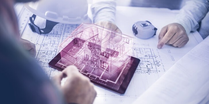 Two people are sitting at a table with construction plans. Between them is a tablet with the purple outline of a 3D house protruding from it.