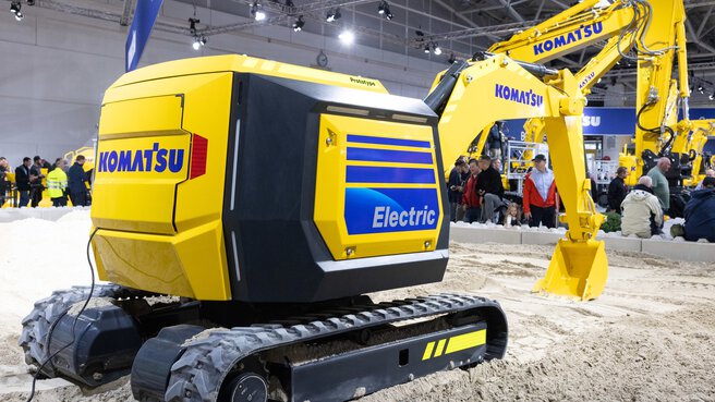 Live demonstration of a Komatsu mini driverless electric excavator at the Komatsu stand at bauma 2022