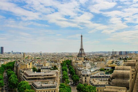 Rooftop view above the city of Paris and the Eiffel Tower
