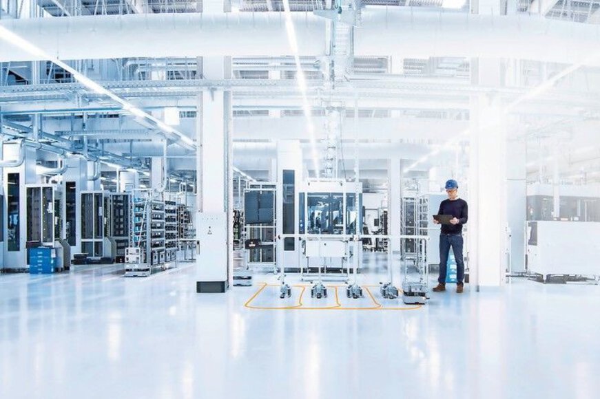 Sensor production in the smart factory: driverless transport systems connect the networked production modules in Sick's 4.0 Now Factory.