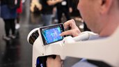 Man wears an exoskeleton with a touchscreen