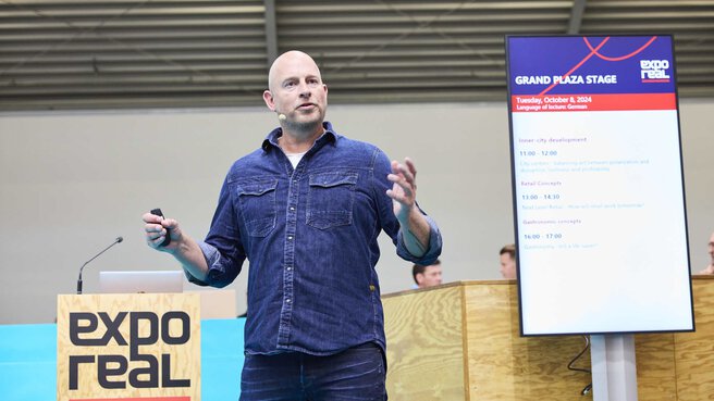 A man is speaking on the 