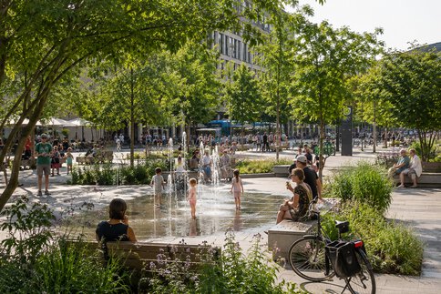 City Plaza with fountain, trees & shadow