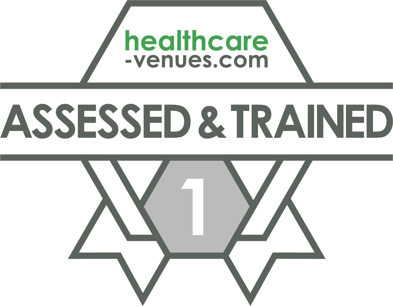 The ASSESSED & TRAINED level 1 certificate from healthcare-venues.com in grey and green lettering on a stylized grey medal.