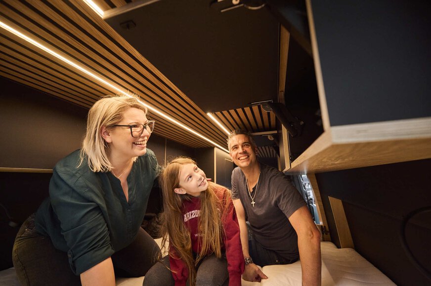 Exhibition hall dislaying mobile homes, camping busses and caravans