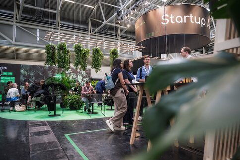 View of the IFAT Munich Startup Area 2026 with startup booths and visitors. 