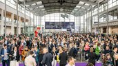 Large crowd in the exhibition hall entrance