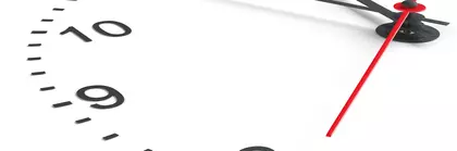 A black dial on a white background, with a red second hand.