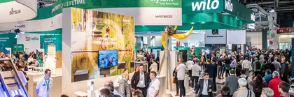 Visitors stream around the exhibition stands at IFAT Munich in Hall C2.