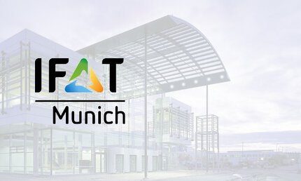 Logo of IFAT Munich with pale gray background photo of the trade fair building.