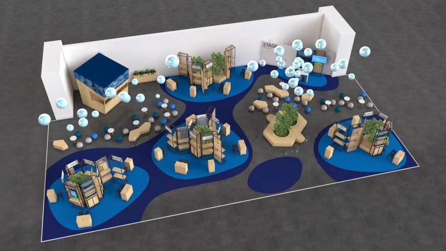 Rendered view of a large, modern exhibition stand with interactive displays, seating areas and decorative plants on a blue carpet.