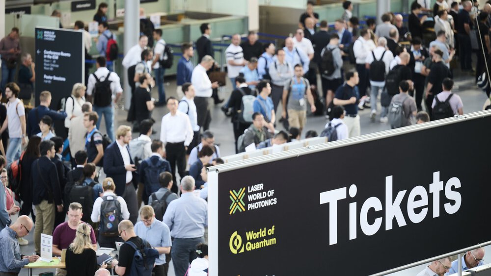 A crowd gathers in the ticket area for LASER World of PHOTONICS.