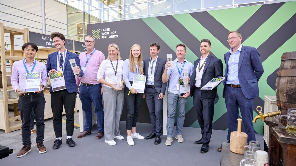 Group photo on stage with all Innovation Award winners 2025