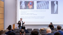Speaker presenting high-performance fiber pumps for wearable soft robotics to a professional audience