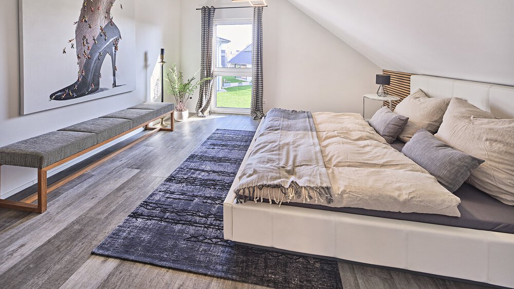 Schlafzimmer Musterhaus Poing-Grub von KAMPA GmbH