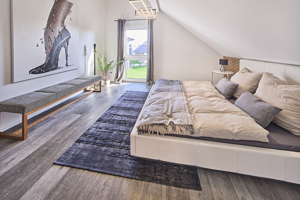 Schlafzimmer Musterhaus Poing-Grub von KAMPA GmbH