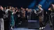 Singer in a brown outfit captivates the clapping audience at the foot of the stage at the INHORGENTA AWARD Gala.