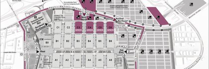 Map of the Munich Trade Fair Grounds showing the halls, entrances, parking lots, and public transportation stops.