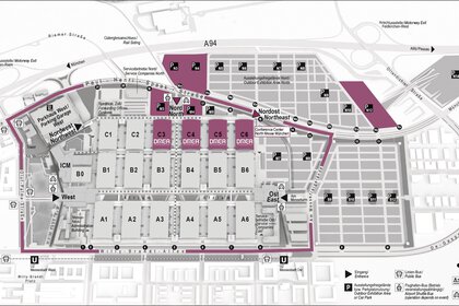Map of the Munich Trade Fair Grounds showing the halls, entrances, parking lots, and public transportation stops.