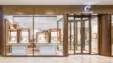 Jewellery shop with elegant shop windows displaying various pieces of jewellery and stylish interior design.