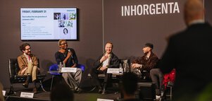 Several people are sitting on a podium at INHORGENTA, discussing how to win Generation Z as customers.