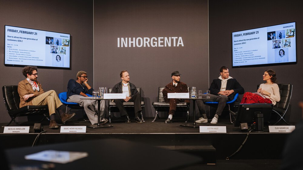 Six people are sitting on a stage at INHORGENTA, discussing how to win over “Generation Z” as customers.