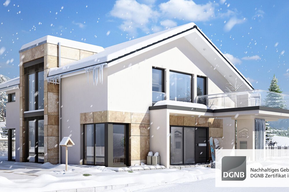 Modernes zweistöckiges Haus in verschneiter Landschaft mit DGNB-Zertifizierungslogo unten rechts.