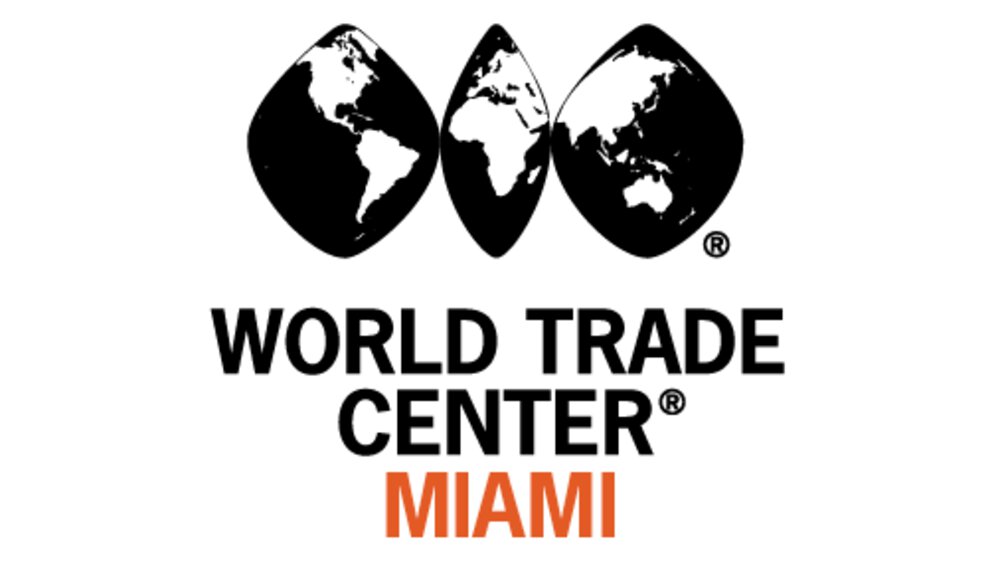 The logo of the WORLD TRADE CENTER MIAMI in black and orange lettering with a globe divided into three parts above it.