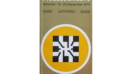 Ein Katalog zur productronica 1975 in brauner Farbe. In der Mitte ist ein schwarz-weißes Viereck in einem gelben Kreis mit weißem Rand zu sehen.