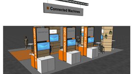 Messestand mit Displays mit der Aufschrift „OPC UA Vision“ und „OPC UA Laser“, unter einem „Connected Machines“-Schild.
