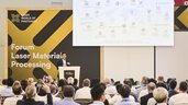 Fachvortrag auf der Laser World of Photonics – ein Redner präsentiert Indiens technologisches Potenzial und wirtschaftliche Stärken im Forum für Laser Materialbearbeitung.