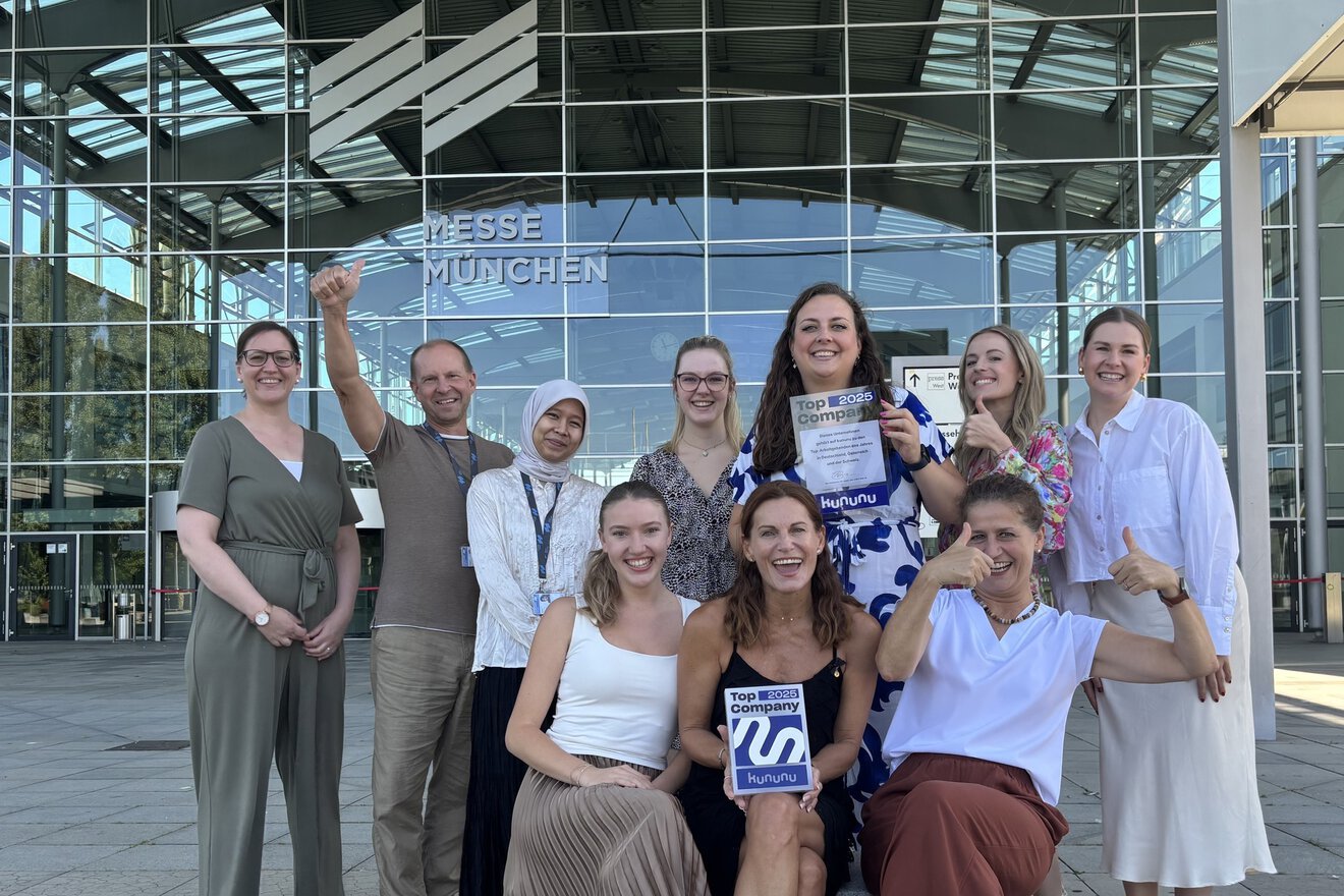 The picture shows colleagues from Messe München with the kununu award.