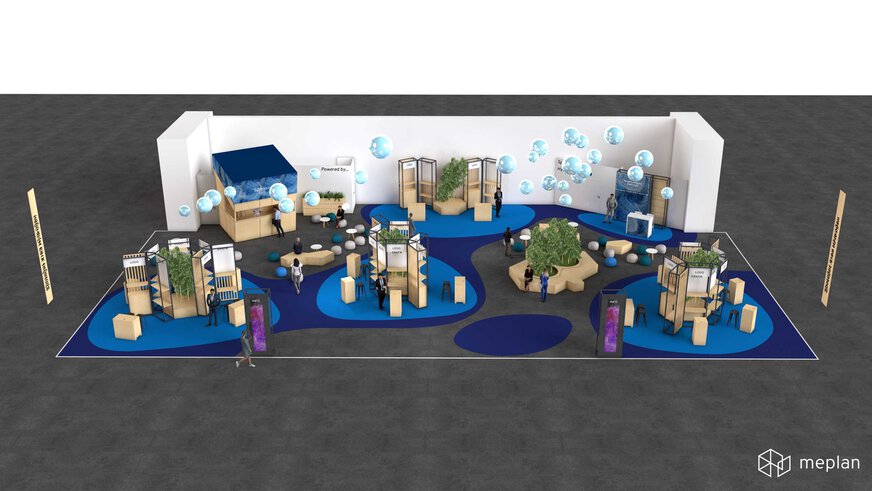 Rendered view of a large, modern exhibition stand with interactive displays, seating areas and decorative plants on a blue carpet.
