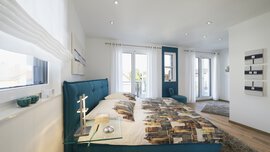 Schlafzimmer Musterhaus Montana von Rensch-Haus GmbH