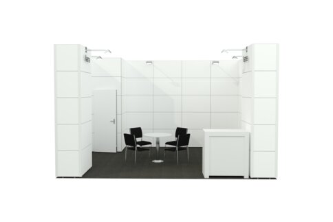 A modern, white exhibition stand with a small table, three chairs and a counter on a carpeted floor.