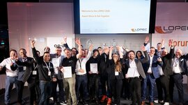 Group photo of award winners on stage at the LOPEC Award Show & Get-Together 2026