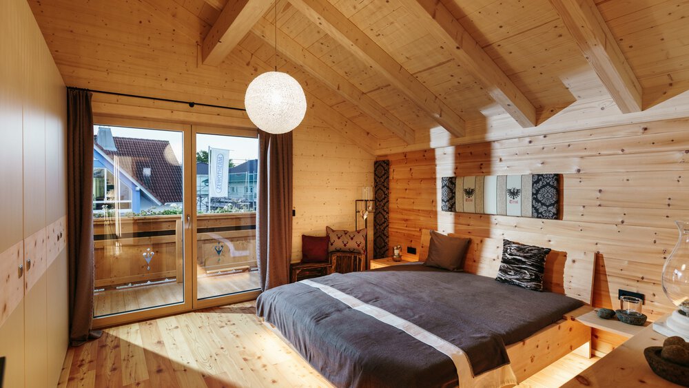 Schlafzimmer Musterhaus Tiroler Holzhaus GmbH 