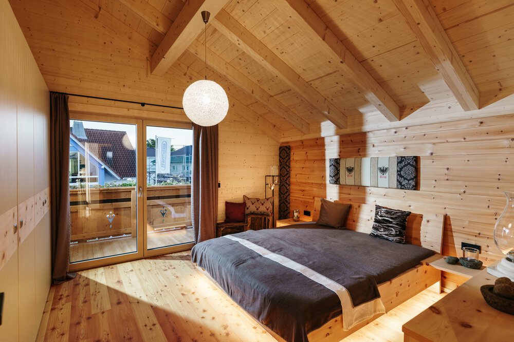 Schlafzimmer Musterhaus Tiroler Holzhaus GmbH 