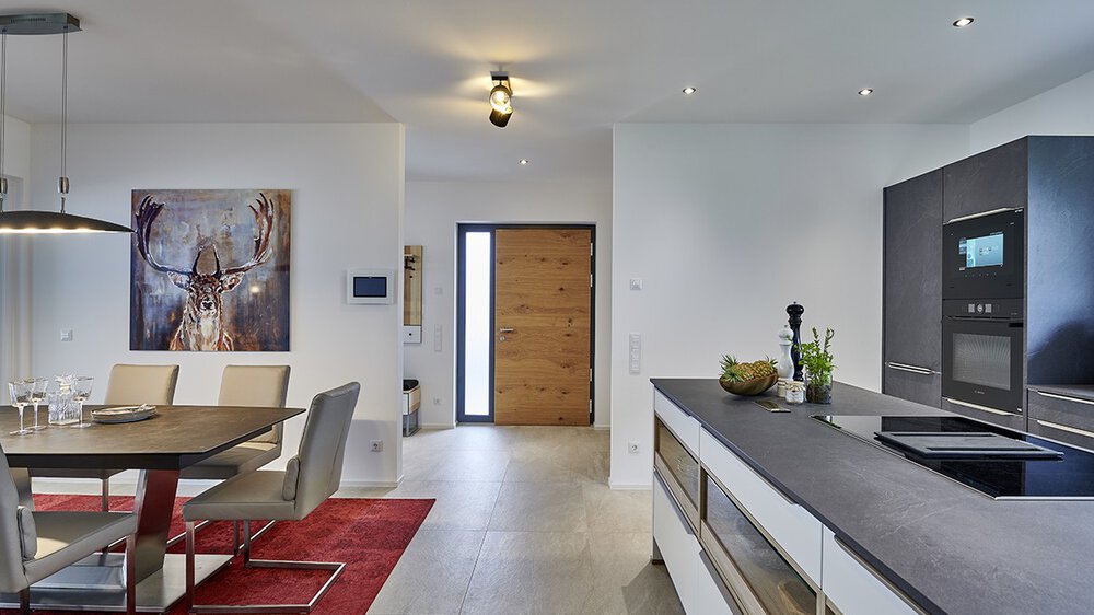 Wohnbereich Essbereich Musterhaus CLARON von KAMPA GmbH 