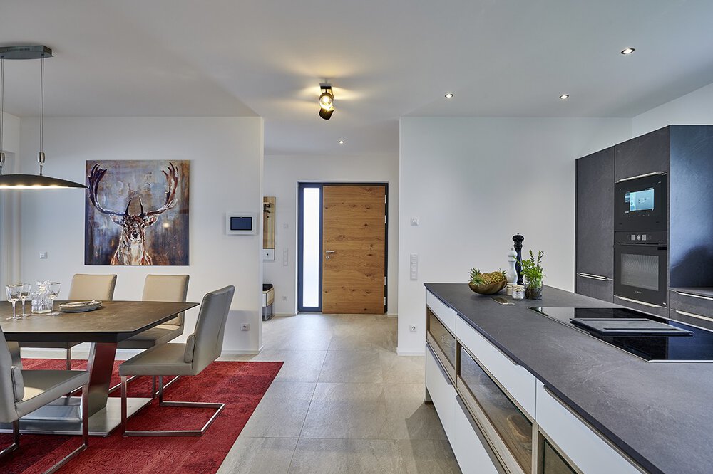 Wohnbereich Essbereich Musterhaus CLARON von KAMPA GmbH 