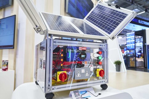 A portable solar module on wheels that can be unfolded. The structure includes inverters, switches and sockets.
