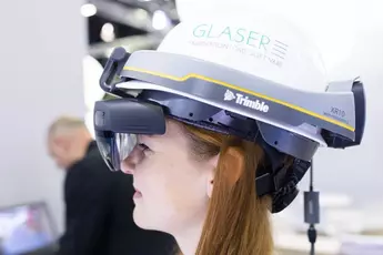 Digital solutions, such as the mixed reality construction helmet shown here, are changing the way people work on construction sites. 